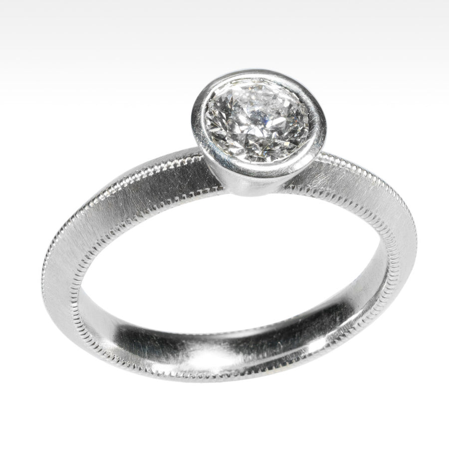 "Bling" Ideal Cut Round Diamond Ring Bezel Set in 18K White Gold - Lyght Jewelers 10040 W Cheyenne Ave Ste 160 Las Vegas NV 89129
