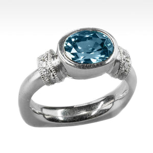 "Exhalt" Cambodian Blue Zircon Ring with Ideal Cut Diamonds in 14K White Gold - Lyght Jewelers 10040 W Cheyenne Ave Ste 160 Las Vegas NV 89129